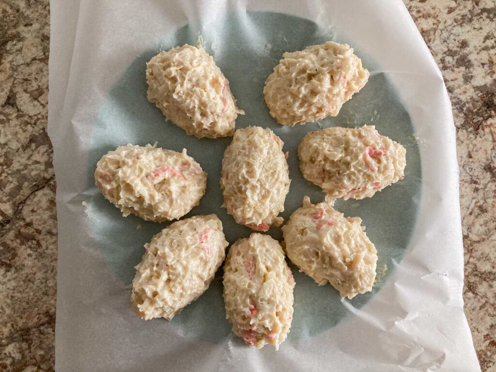 eight white sauce shaped into oval for creamy crab croquettes