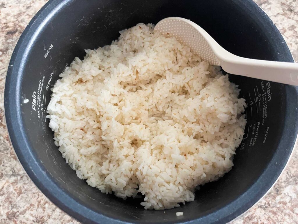 rice and dashi powder mixed in a rice cooker