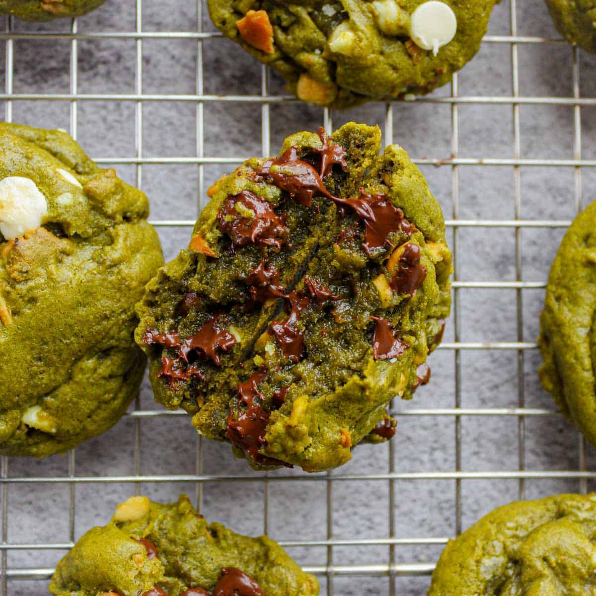 matcha chocolate chip cookie cut into half.