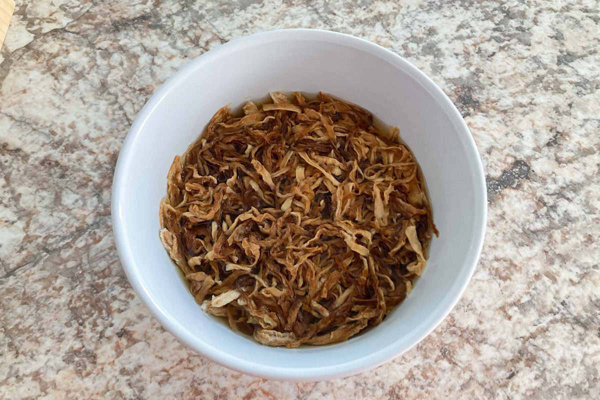 kiriboshi daikon soaked in water in a bowl.