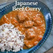 Japanese beef curry on a blue plate.
