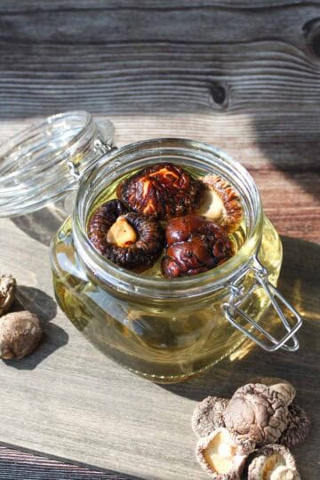 Shiitake dashi in a glass container.