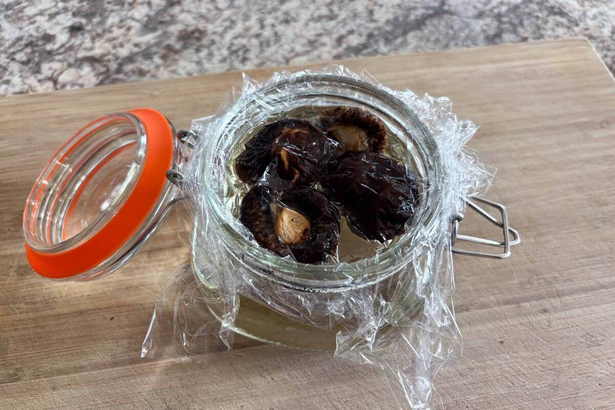 Shiitake dashi in a glass container.