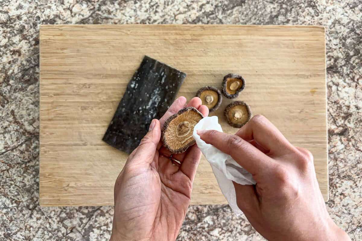 wipe kombu and dried shiitake with wet paper towel.