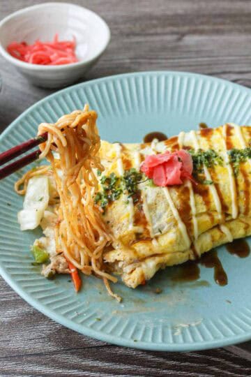 Omusoba, Japanese stir fry noodles (yakisoba) wrapped in omelet.
