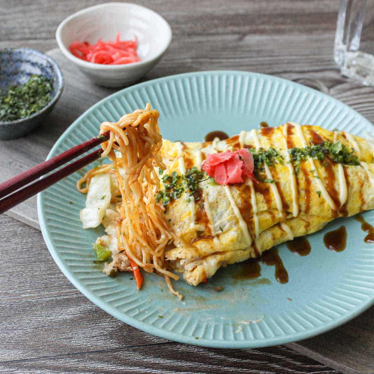 Omusoba, Japanese stir fry noodles (yakisoba) wrapped in omelet.