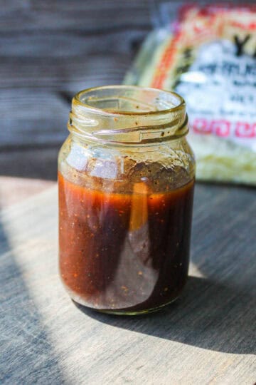 Homemade yakisoba sauce in a bin.