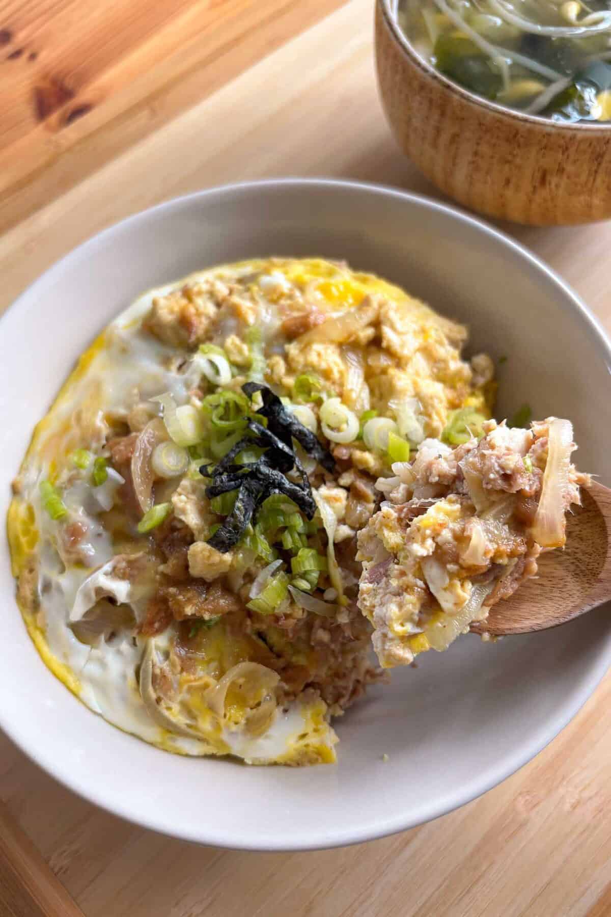 Japanese tofu and egg donburi rice bowl.