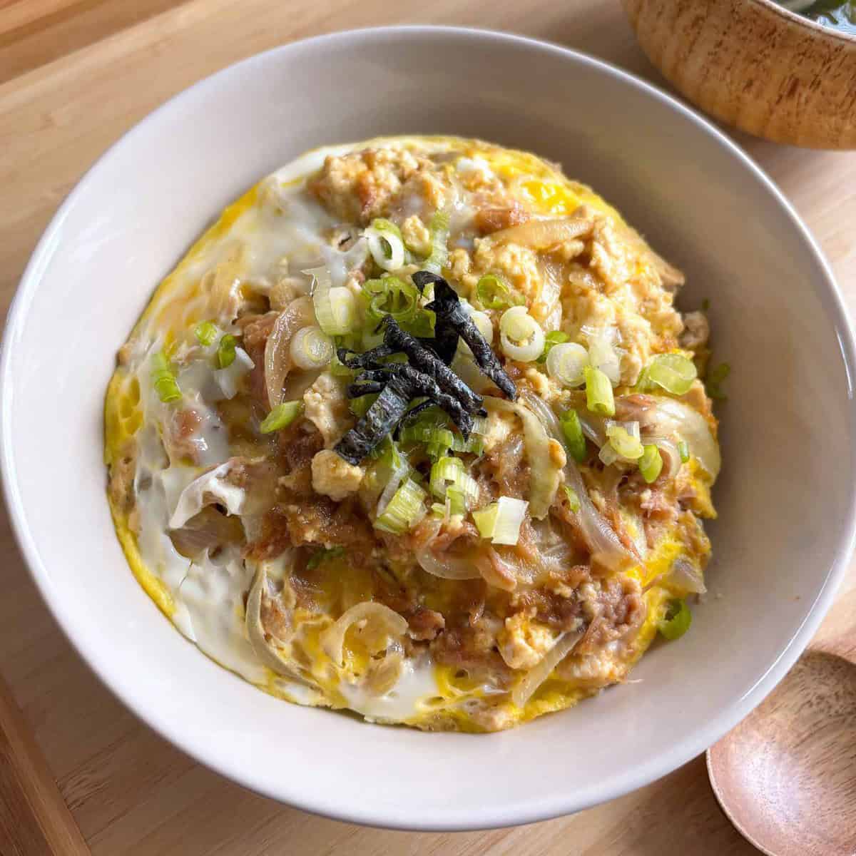 Japanese tofu and egg donburi rice bowl.