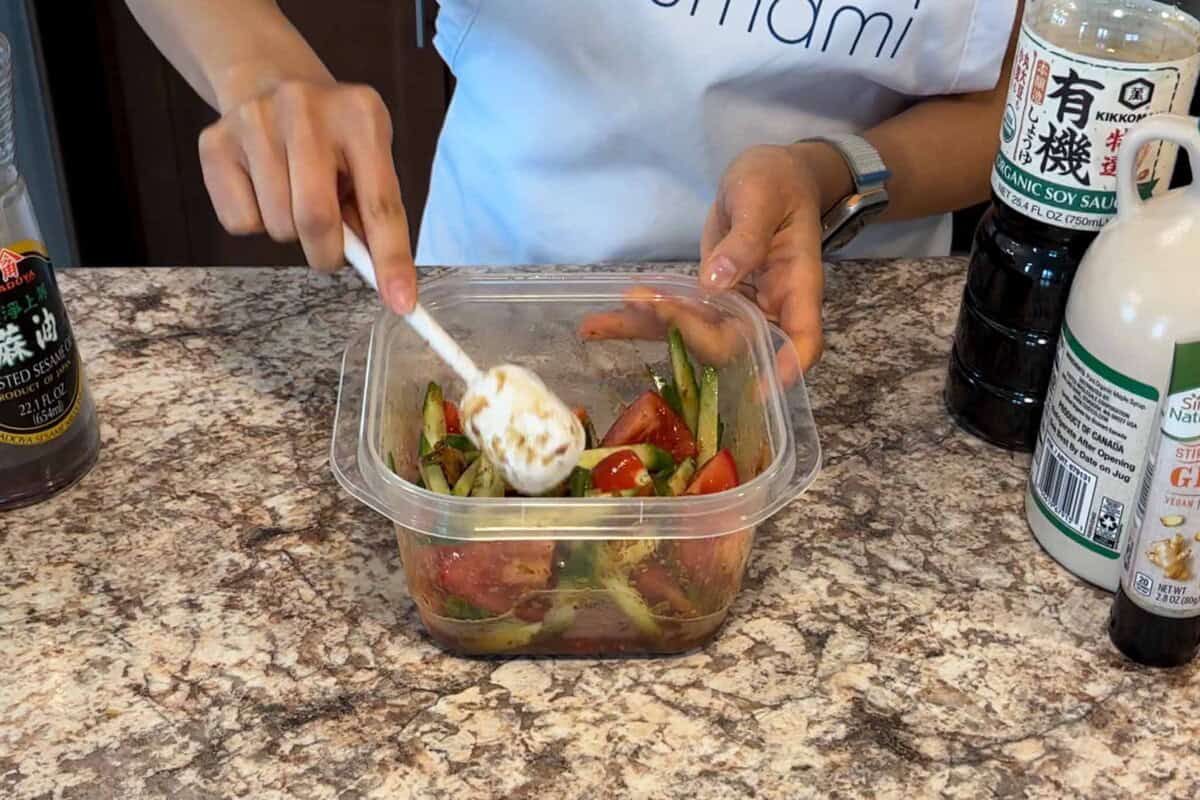 Mix in tomatoes and cucumbers and combine everything well.