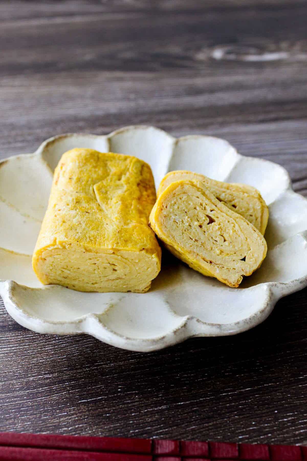 Tamagoyaki, Japanese rolled omelet on a plate.