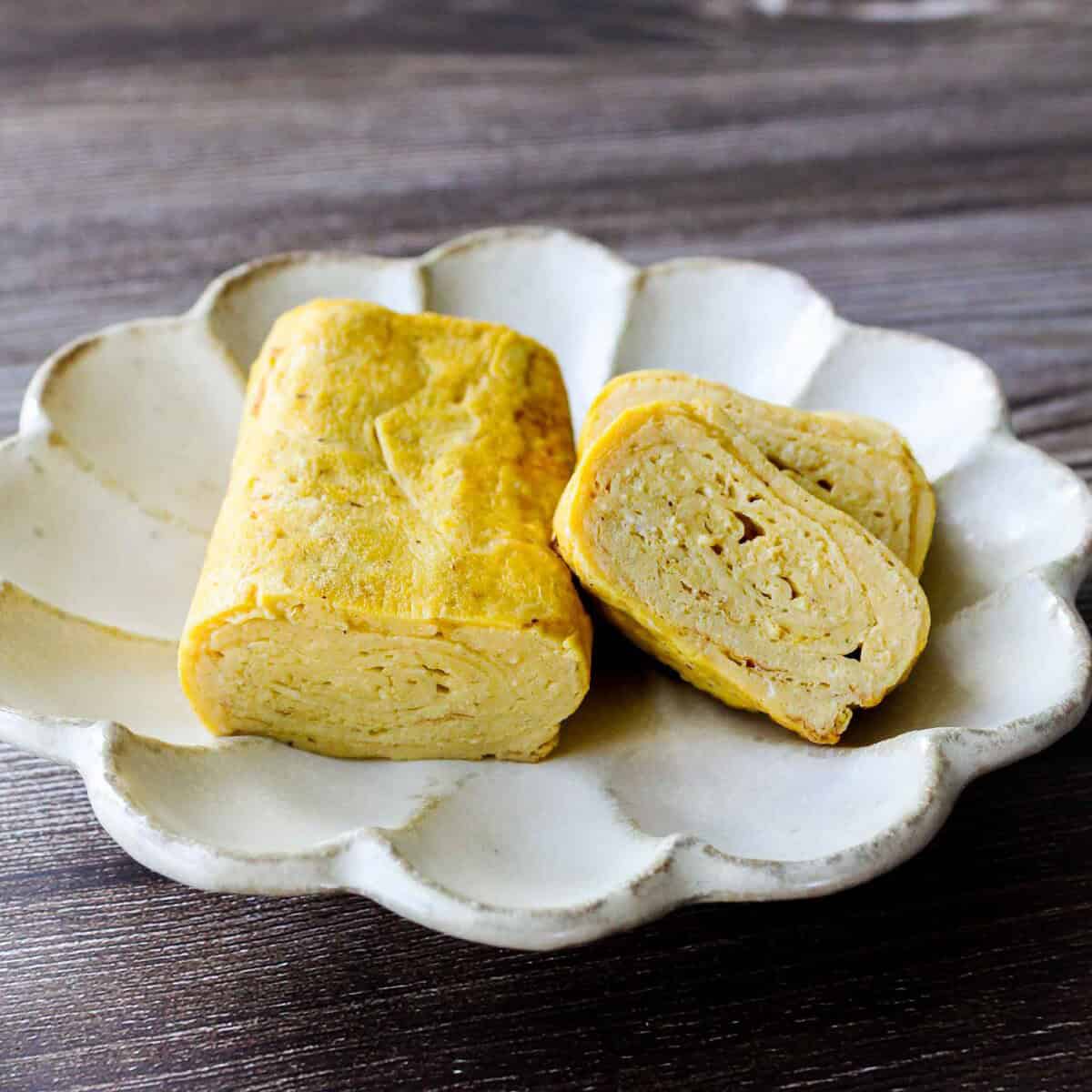 Tamagoyaki, Japanese rolled omelet on a plate.