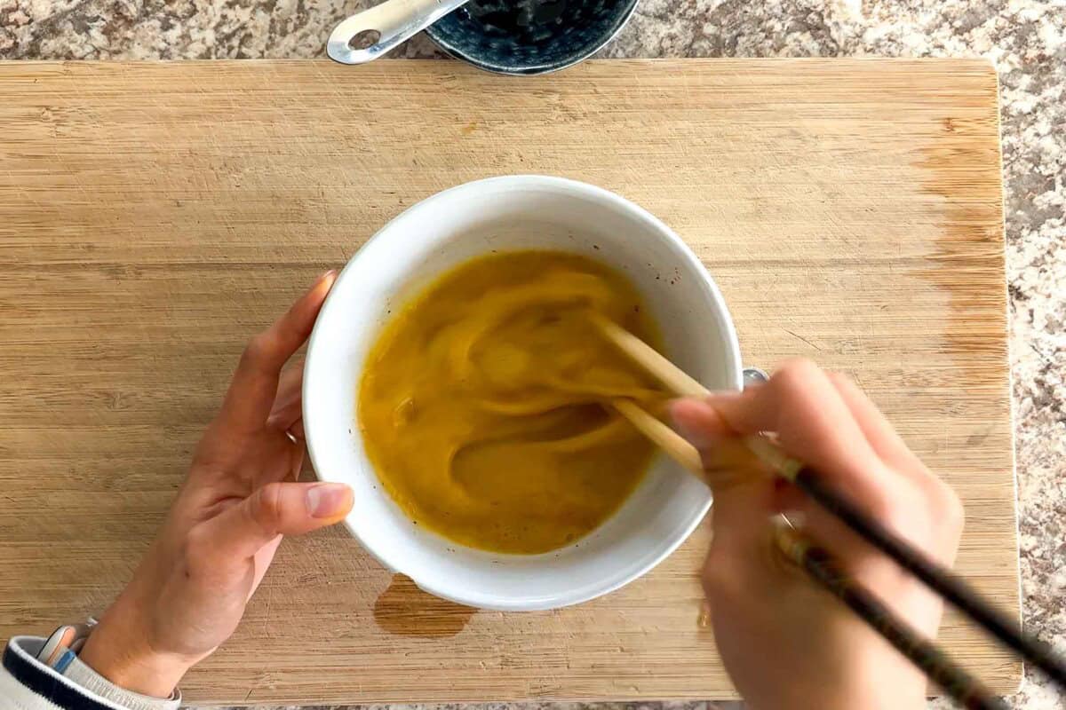Mix all ingredients for tamagoyaki in a bowl.
