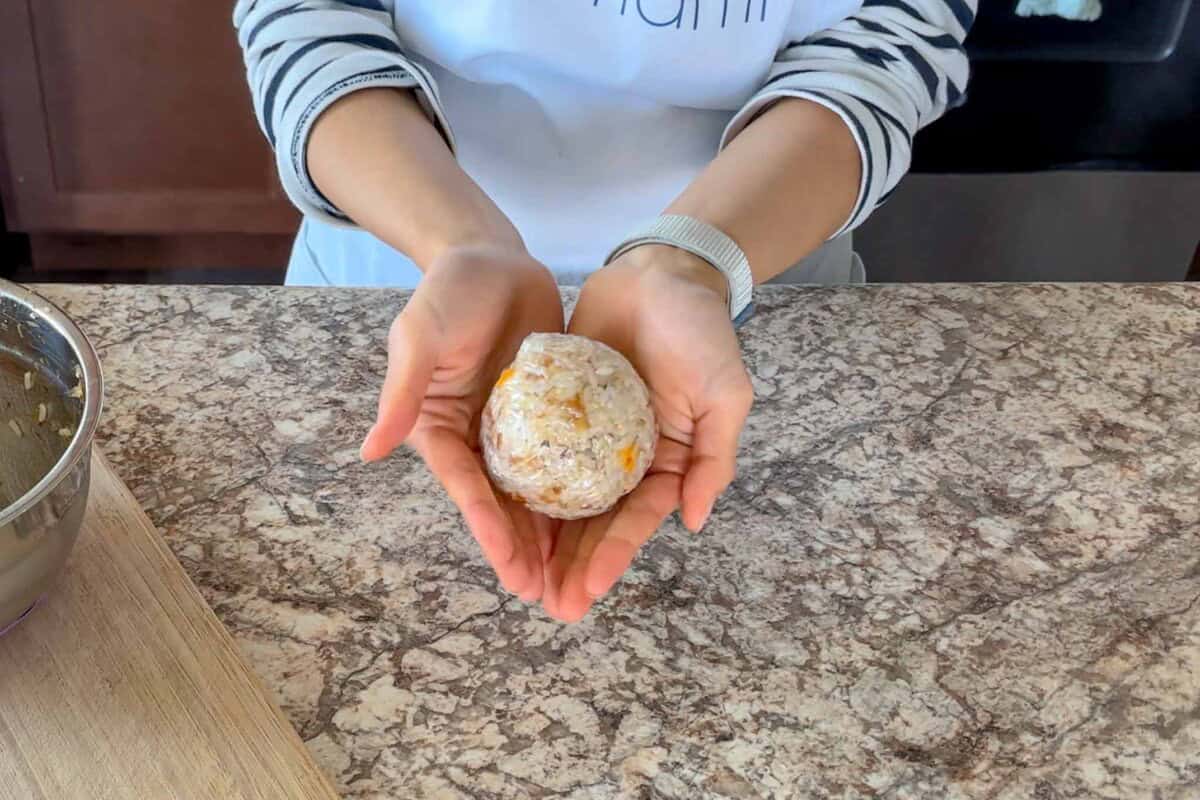 Shape onigiri into balls.