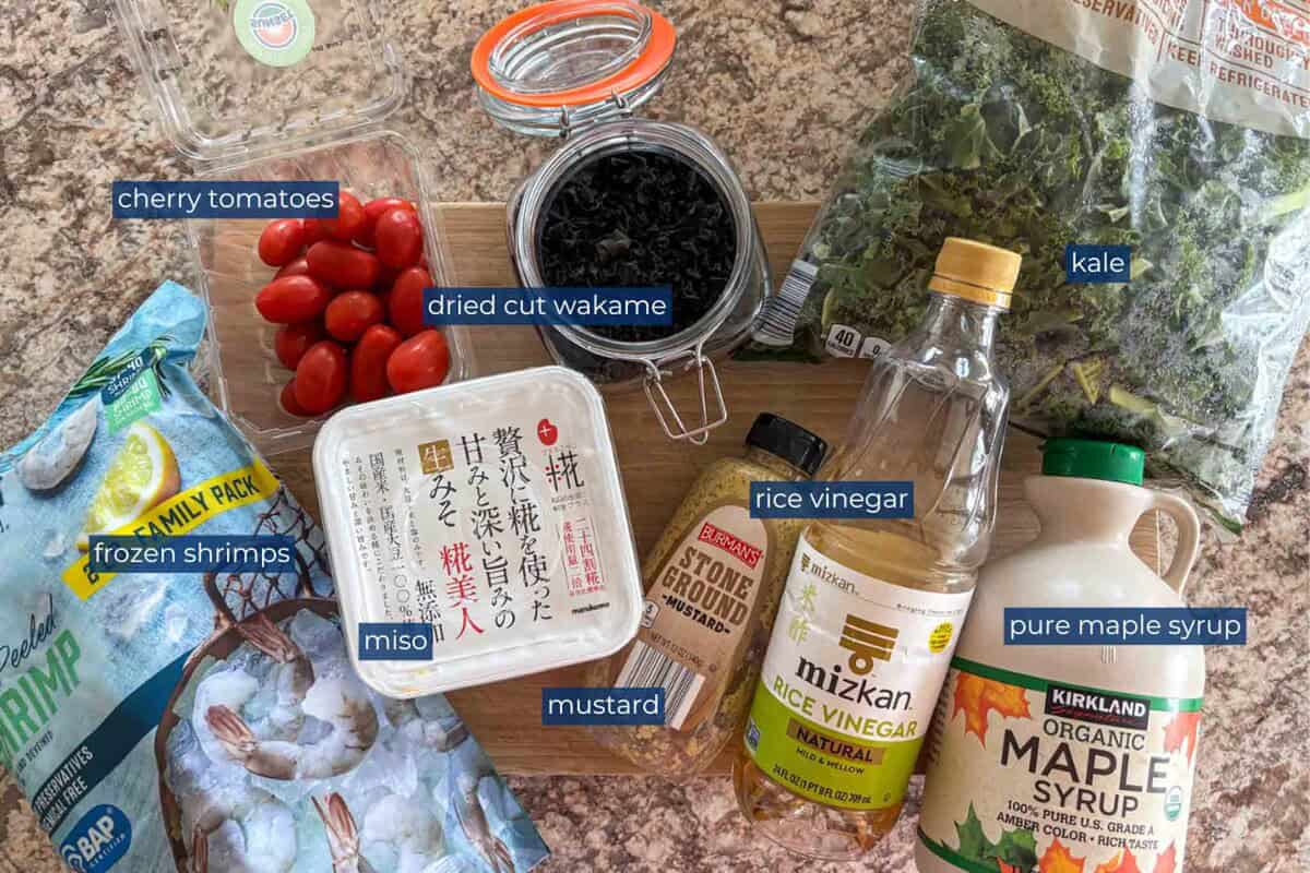 Ingredients to make Japanese miso vinaigrette salad with kale and shrimps.