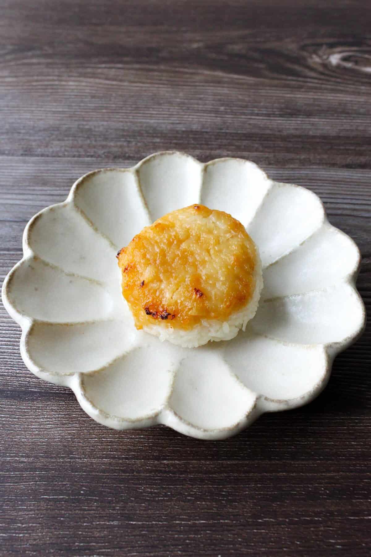 Miso yaki onigiri on a plate.