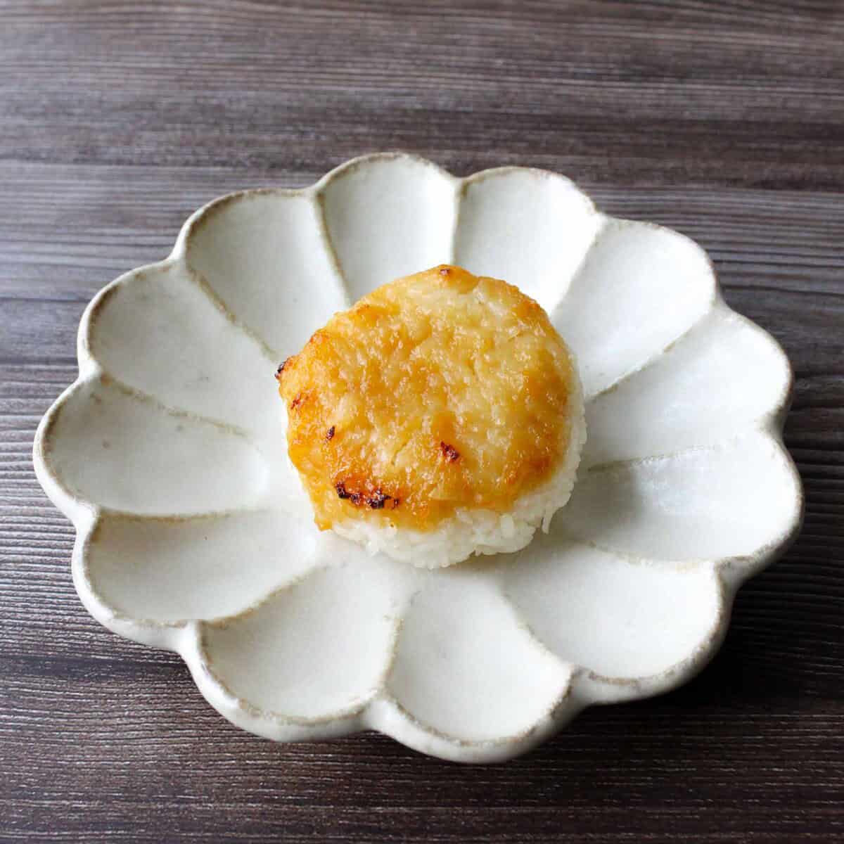 Miso yaki onigiri on a plate.