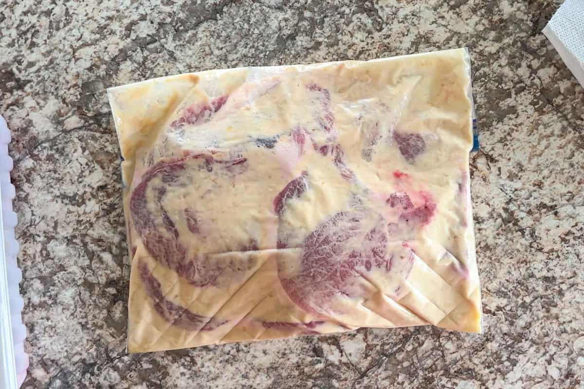 Marinate pork in miso yogurt marinade.