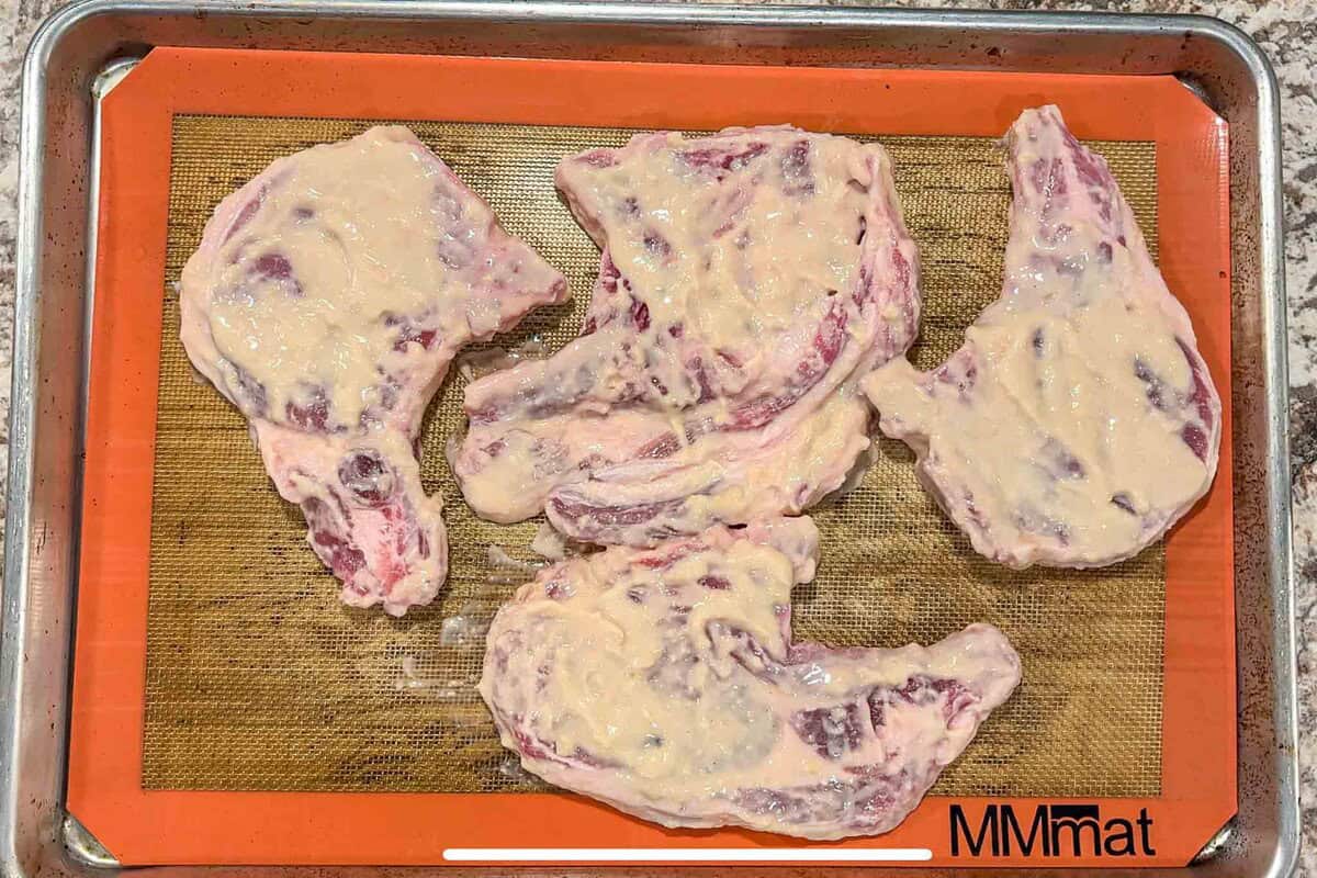 Spread the remaining marinade.